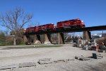 Three GP's roll east over the bridge over the White River