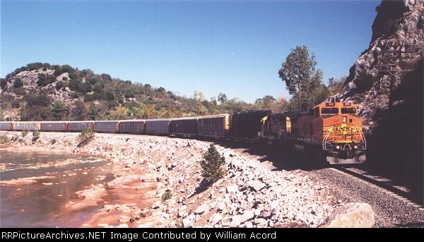 BNSF 502 leading auto racks along Washita River