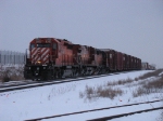 CP 6005, as the only working unit, slowly drags X500 over the hill