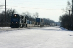 NS 2564 starts through town while another westbound creeps up behind him