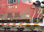 Tight shot of the cab of CP 9575 crossing River Road