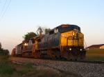 CSX 7797 & 7627 rolling west in the last rays of light with Q335-09