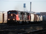 CN 5748 & 5781 leading M301 westward out of the yard