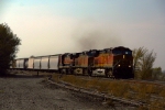 BNSF C44-9Ws 4371 and 4877, along with B40-8 8639, lead an eastbound 