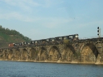 NS 5172 leads 7 other units and 1 car west across Rockville Bridge headed for Enola