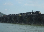 NS 9368 & 7 other units lead 34A across Rockville Bridge