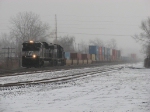 NS 2705 & 2504 head west through the snow with 23Z