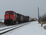 M394's conductor prepares to shield himself from flying debris as M398 runs around his train