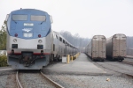 Amtrak train #53 waits as the last autos are loaded 