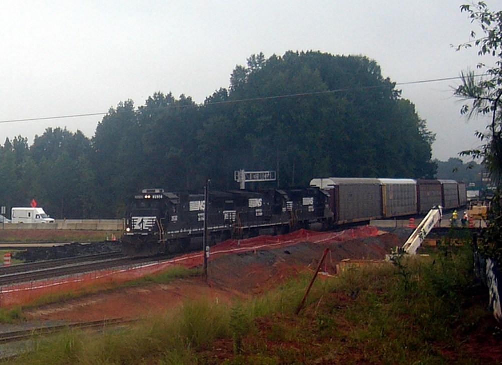 2 NS GE B32-8s and an NS GM/EMD GP60 Roll a Southbound Unit Autorack Train through the Pleasant Hill Road Grade Crossing