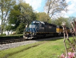 HLCX (Helm Leasing Company) GM/EMD SD40-2M 6328,CRIX/NREX (National Railway Equipment) ex UP GM/EMD SD60 5976 and UP GE CW40-8 9390 Idle with a Southbound Manifest at the Due West Road Grade Crossing