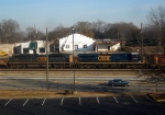 a CSX GM/EMD SD70ACE and a CSX GE ES44DC Lead an Intermodal Stack train