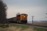 BNSF 9874 leads a coal load south.