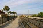 Kelso depot, California. One may notice the decreasing downhill slope when looking at the rear of the stack train in the background.