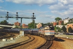 Eastbound eases through curve into station