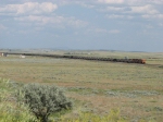 BNSF 9345 & 9304 work eastward as DPU's across the wideopen northeastern Wyoming landscape