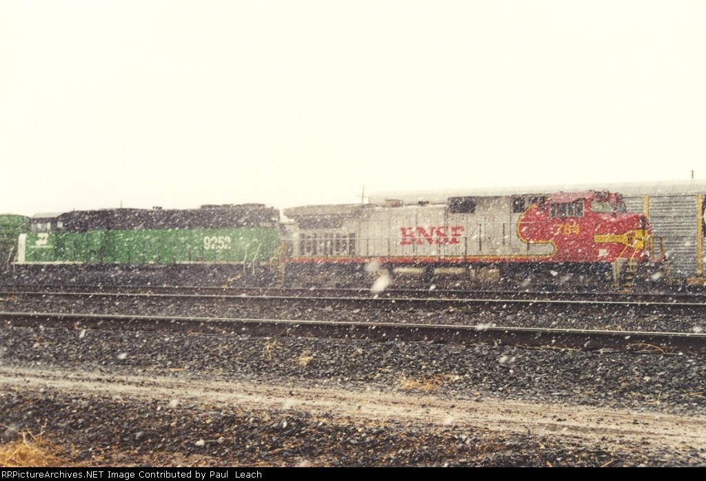 Westbound manifest waits in yard as the snow falls