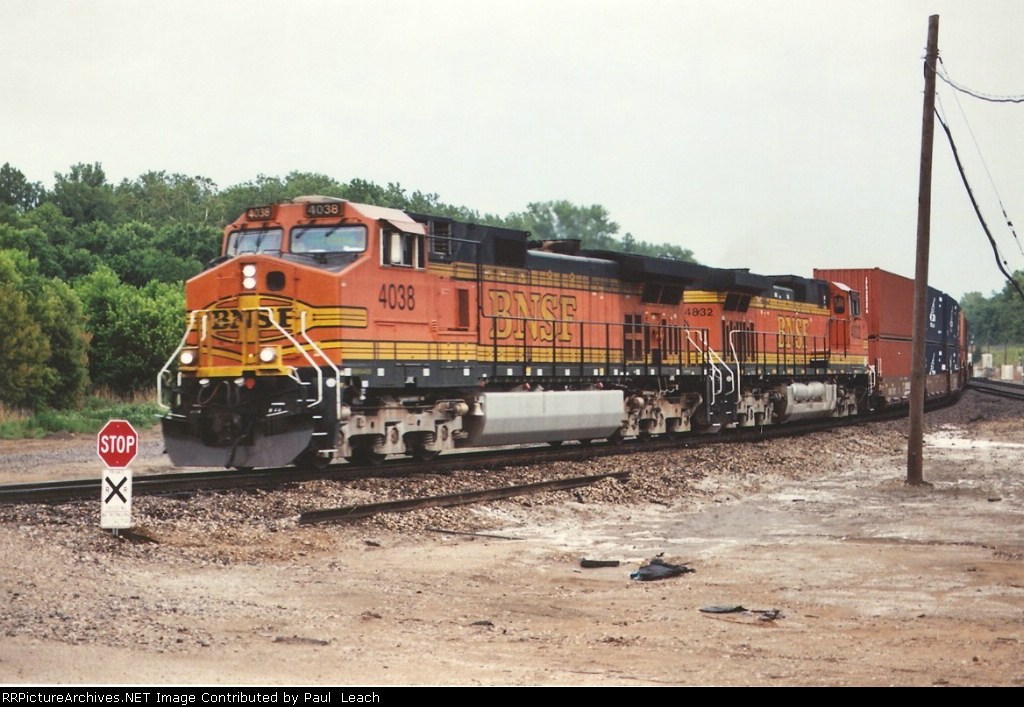 Westbound stack train curves toward Topeka