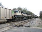 E949-28 rolls west as D801/N903 waits in the siding