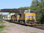 UP 7872 leads KG1SE west under the BNSF Barstow Sub