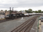 NS 9299 & 9689 lead 205 west under the CP421 signal bridge