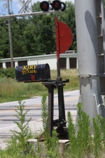 KJRY mailbox on an old switch stand