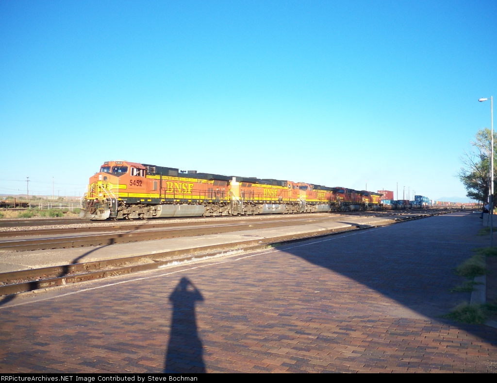 The cameraman and BNSF Dash 9's