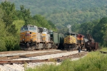 SB grain train under the watchful eye of conductor from the NB