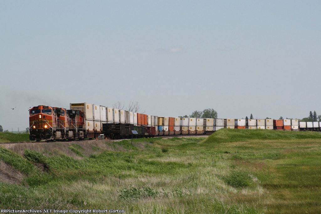 Glasgow Subdivision Z Train Wraps Around a Curve West of Town