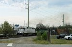 GCFX 3077 leads another leaser and NS unit on CSX train Q409