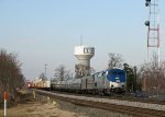 AMTK 177 leads train 80, the Carolinian, past the rear of NS train 213