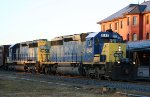 CSX 8143 & 8440 lead a train northbound early in the morning