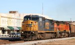 CSX 7325 & BNSF 812 lead a grain train southbound