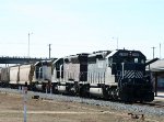 HLCX 7188 leads an empty grain train northbound