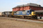 CSX 7640 & 7804 lead an empty grain train northbound