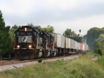 NS 7111 leads train 213 southbound past the signals