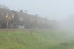 CP 8764 disappears in the fog.