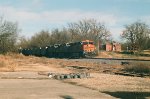 Southbound coal with BNSF power leading KCS units