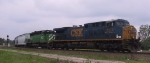 CSX 5113 leads a lease unit eastbound out of the yard