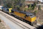 UP 9658 leads a CSX train into$town