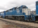 Kelowna Pacific Railway train passes through the Okanagan Valley Railways yard. LLPX 2606.