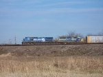 CSX 7333 waits for UP 9767 to pass