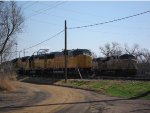 Union Pacific SD 60Ms 2458 and 2429 with HLCX GP38-2 1038 stand watch at the Union Pacific Salina, Kansas yard while a train prepares for departure westbound.