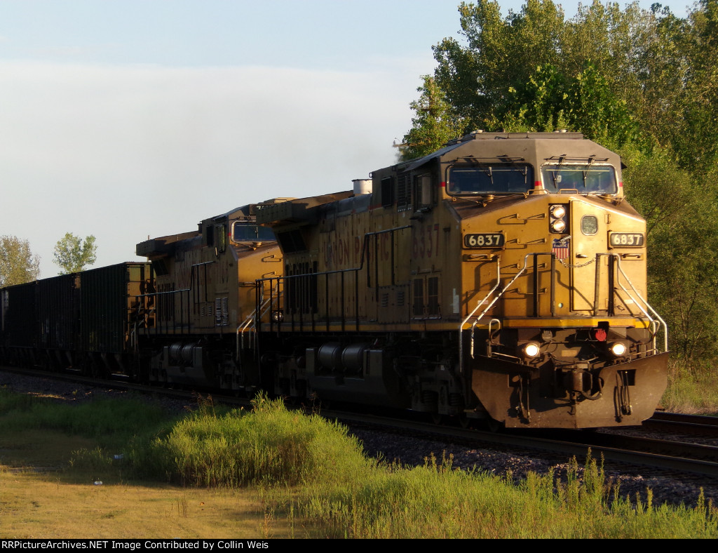 The sun hits the nose of UP 6837 on the Tennessee Valley coal bucket