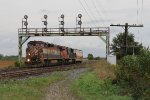 M331 pulls west into the plant at Paris West with one idler car for their pick up out of the siding