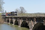 NS 8125 with NS 1071 slowing crossing bridge