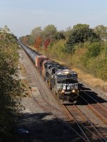 With the NYC Heritage unit trailing second out, 64W rolls east with oil loads