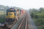 Q434-24 takes the siding at CP-118 as the X433 approaches the stop signal on the main