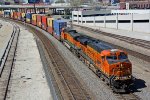 BNSF 7860 Heads up a stack train..