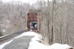 CSX 697 peeps around the curve and through the bore of Kingston Tunnel